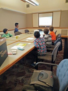 Kids learning from a WSMA PowerPoint lesson.